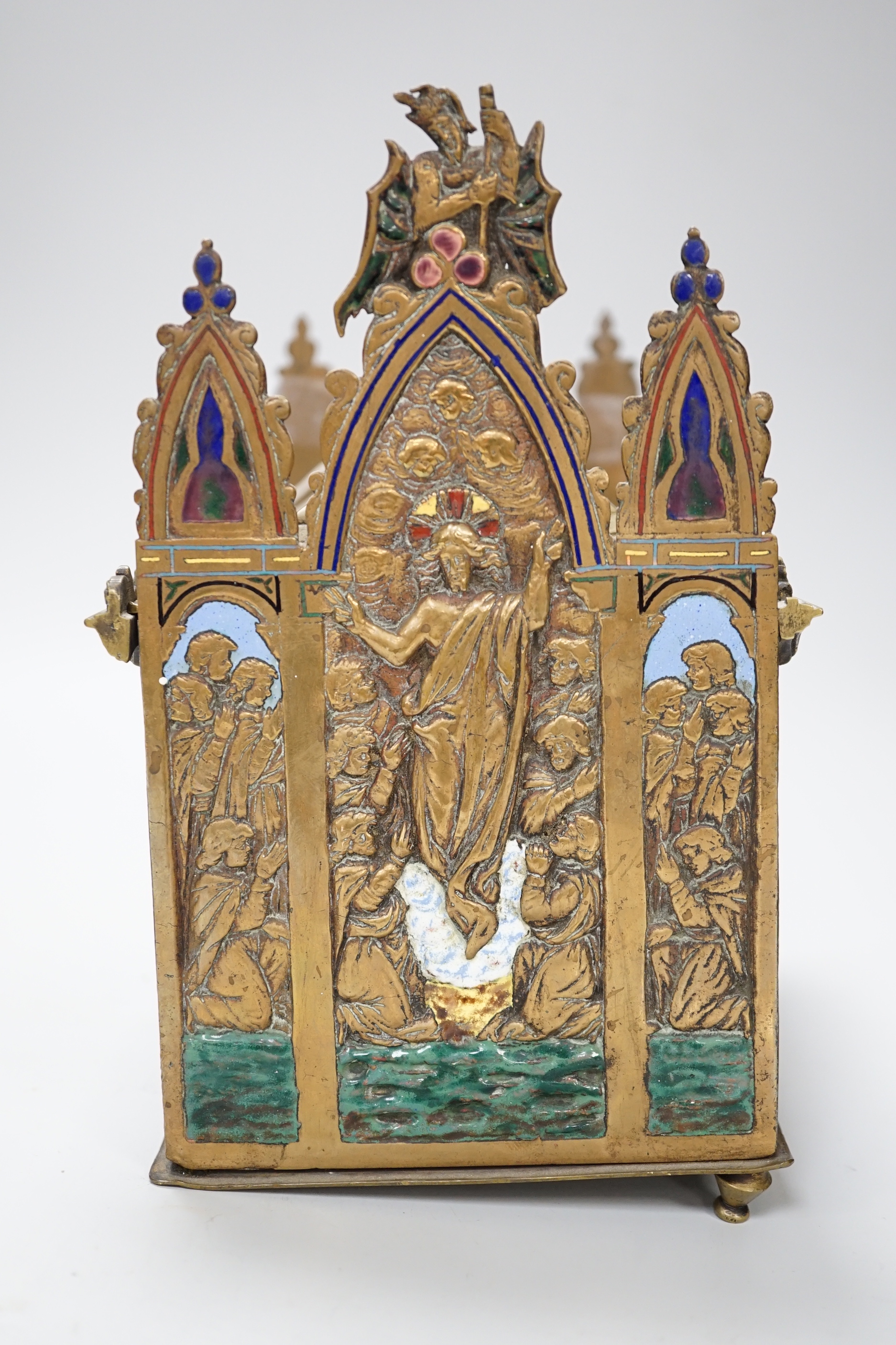 A late 19th century replica of a medieval brass and champleve enamel reliquary casket, 21.5cm high x 19cm wide